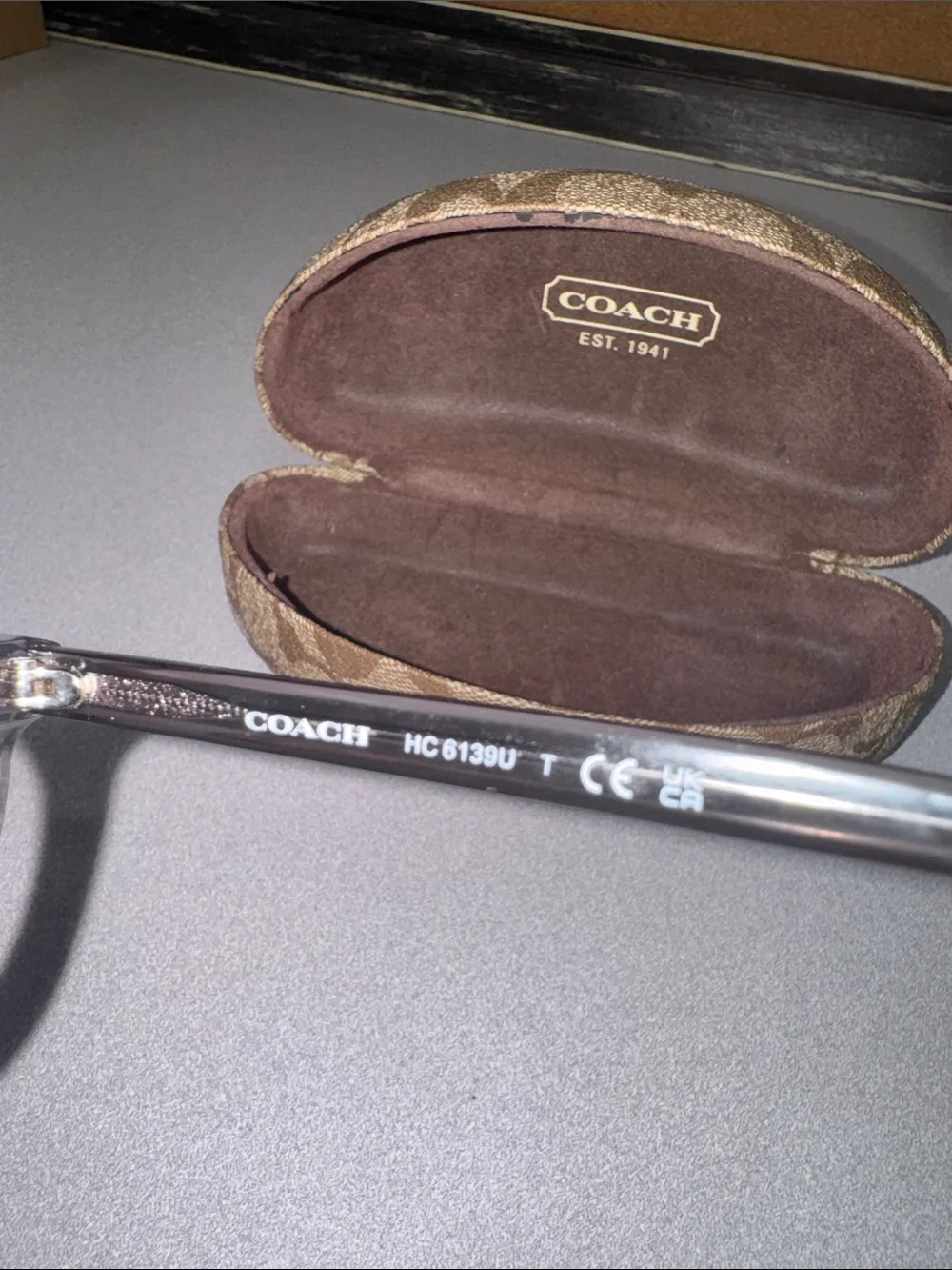 Coach branded signature